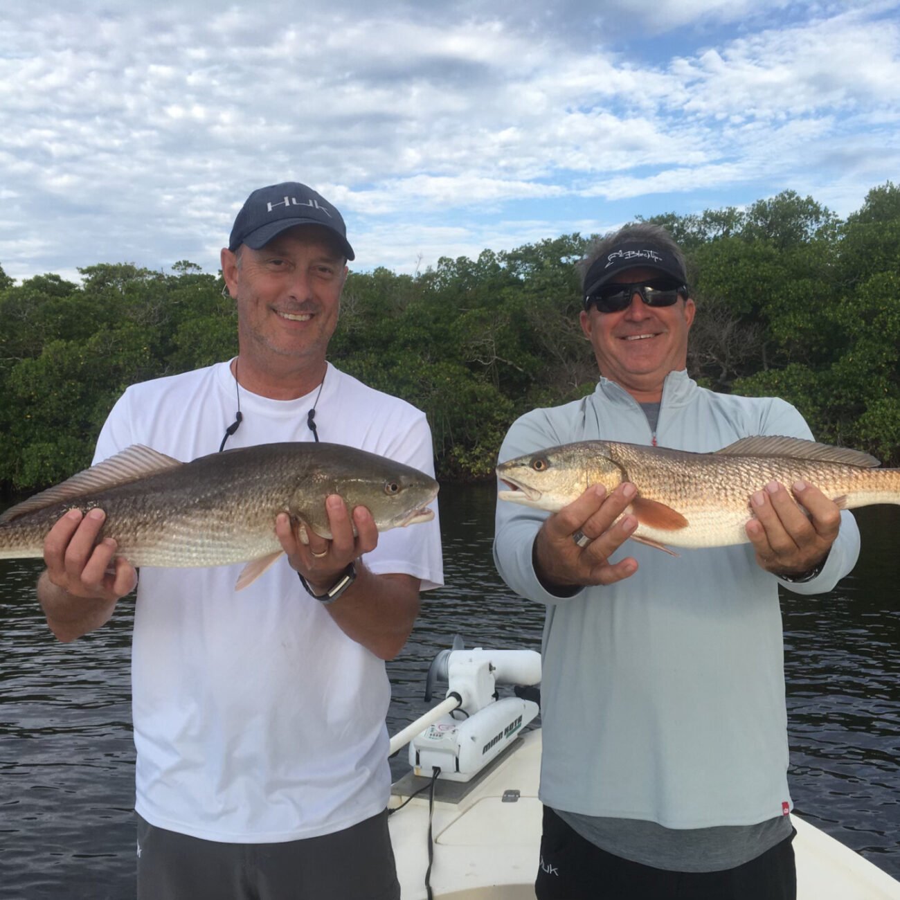 A catch held up aboard Reel Escapes